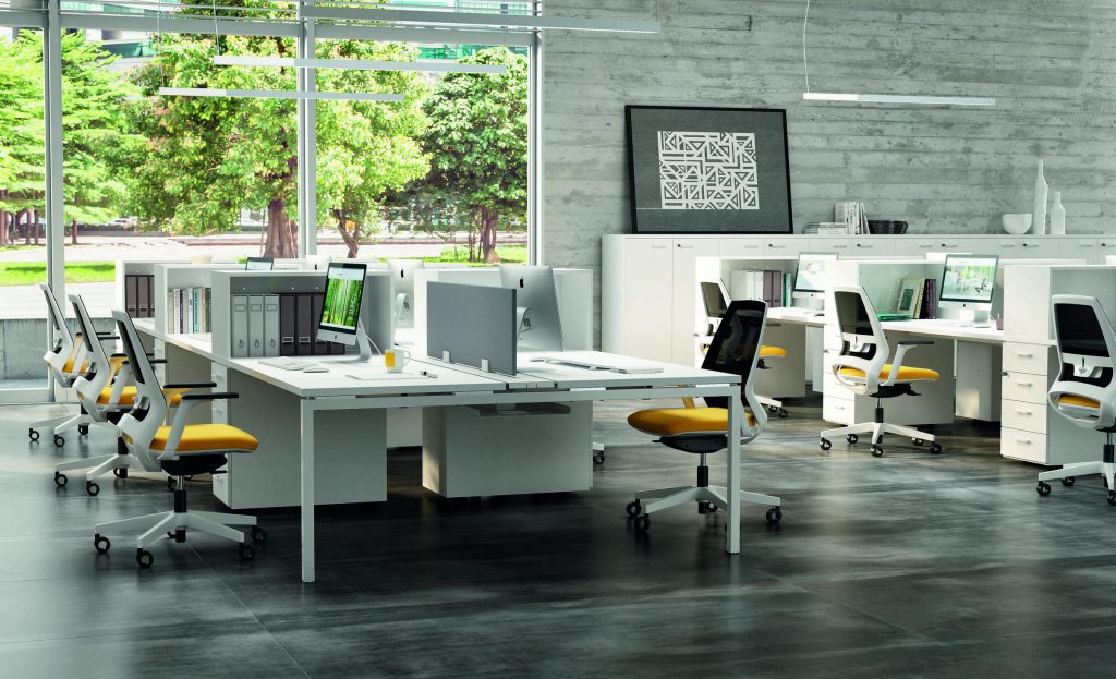 open plan office with white desks